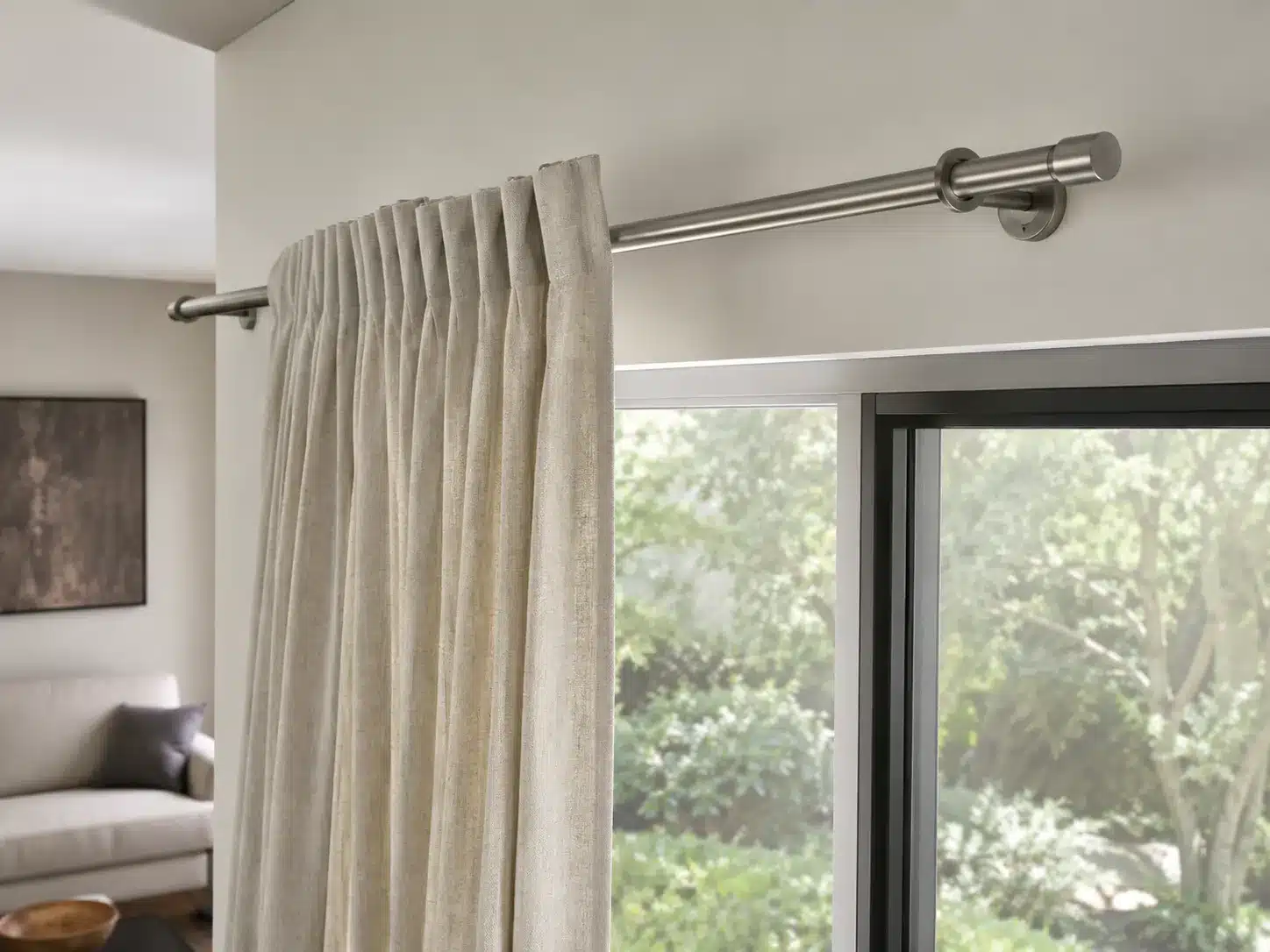Double curtain rod system with sheer and blackout curtains
