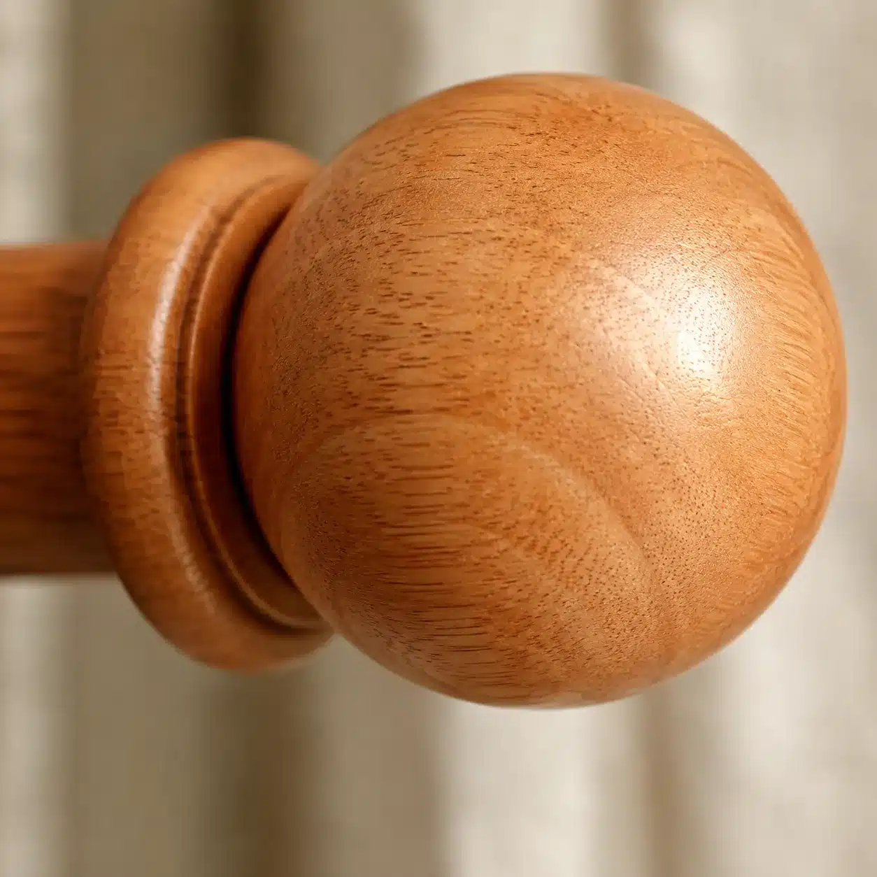 Wooden curtain rod finial detail